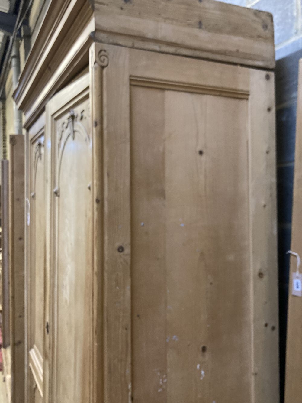 A 19th century French pine two door knockdown wardrobe with drawer and base, width 152cm depth 66cm height 234cm